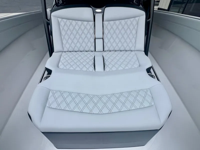 Slide: The Image of 2025 Nor-Tech 340 Sport Center Console with luxurious diamond-stitched seating in a sleek design. - 29