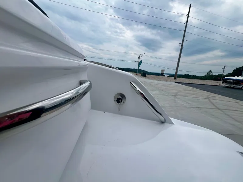 Slide: The Image of 2025 Nor-Tech 340 Sport Center Console boat detail with sleek design and chrome accents. - 6