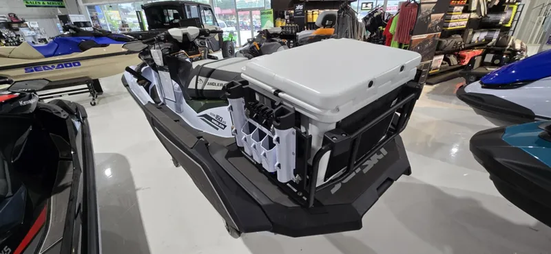 Slide: The Image of 2025 Kawasaki Jetski Ultra 160 LX-S Angler in showroom, featuring fishing gear storage. - 10