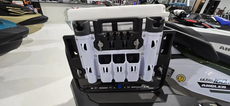 Slide: The Image of 2025 Kawasaki Jetski Ultra 160 LX-S Angler with fishing rod holders in showroom. - 11
