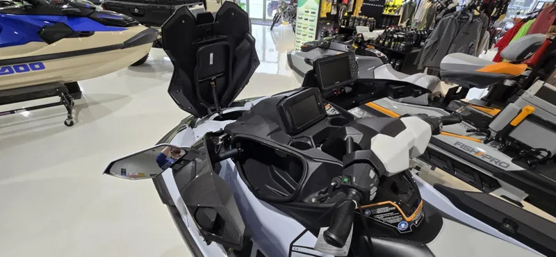 Slide: The Image of 2025 Kawasaki Jetski Ultra 160 LX-S Angler in showroom, featuring advanced controls and seating. - 6