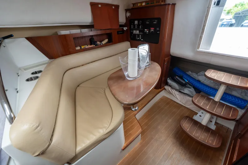 Slide: The Image of 2007 Pro-Line 35 Express cabin interior with beige seating and wooden accents. - 18