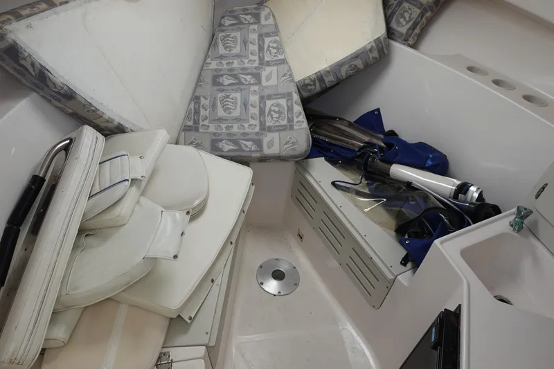 Slide: The Image of 2004 Polar 2300 Walkaround cabin interior with cushions and equipment. - 17