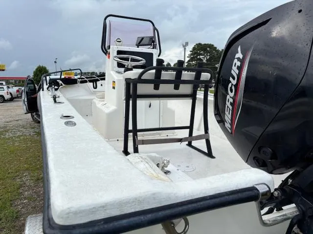 Slide: The Image of 2021 May-Craft 1800 Skiff with Mercury engine, parked outdoors on a cloudy day. - 10