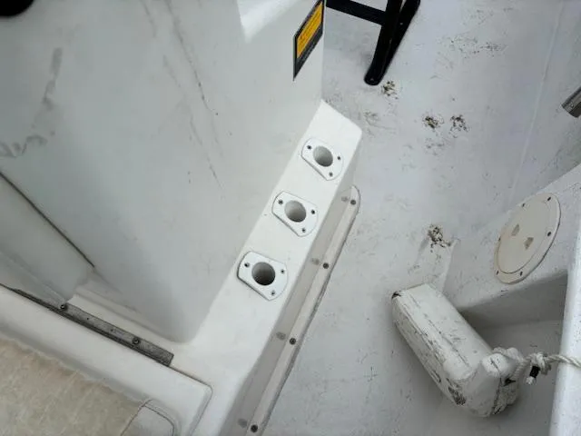 Slide: The Image of 2021 May-Craft 1800 Skiff interior with rod holders and deck details. - 17