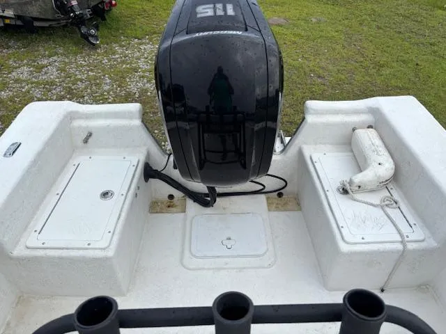 Slide: The Image of 2021 May-Craft 1800 Skiff boat with outboard motor, viewed from the rear deck. - 19