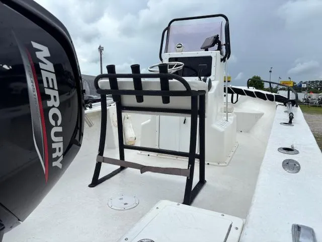 Slide: The Image of 2021 May-Craft 1800 Skiff boat with Mercury engine, white deck, and center console. - 9