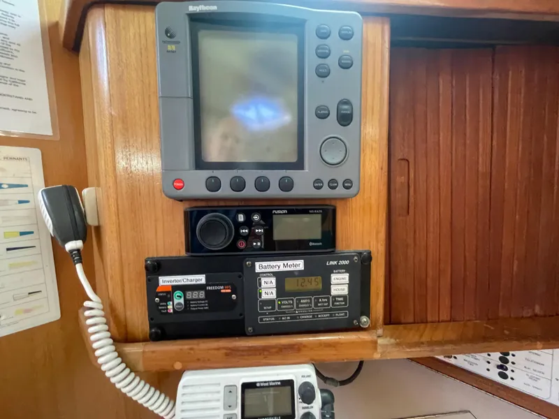 Slide: The Image of Navigation and communication equipment on a 1999 Catalina 42 MkII sailboat. - 11