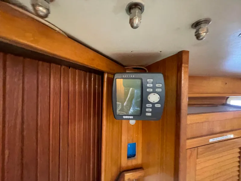 Slide: The Image of Control panel inside 1999 Catalina 42 MkII sailboat cabin. - 12