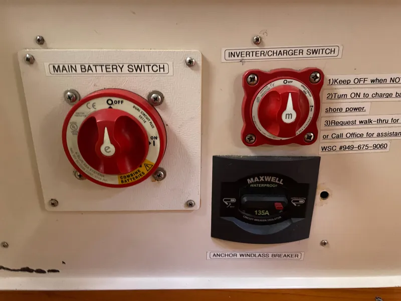 Slide: The Image of Main battery and inverter switches on a 1999 Catalina 42 MkII yacht control panel. - 13