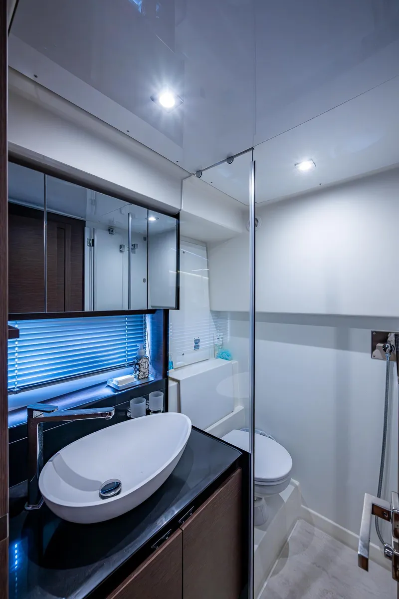 Slide: The Image of Luxurious bathroom in 2019 Prestige 460 yacht, featuring modern sink and sleek design. - 46