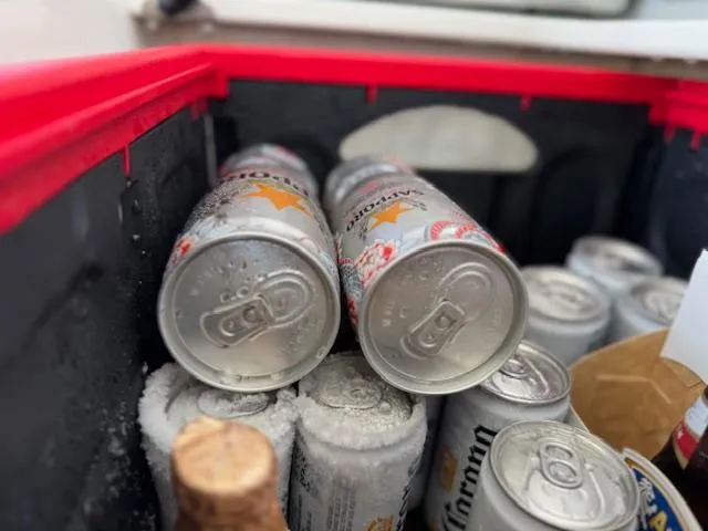 Slide: The Image of Cans of beer in a cooler on a 2022 Formula 430 Super Sport Crossover. - 11