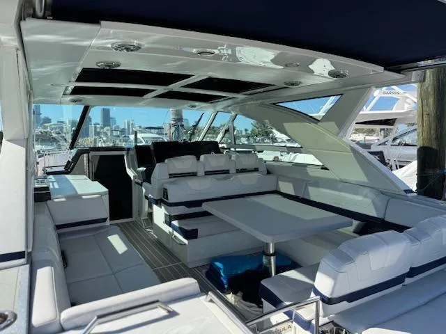 Slide: The Image of 2022 Formula 430 Super Sport Crossover yacht interior with luxurious seating and modern design. - 14