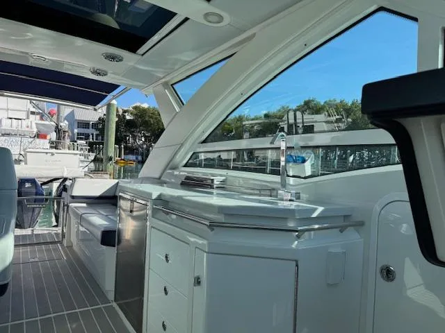 Slide: The Image of 2022 Formula 430 Super Sport Crossover yacht interior with sleek design and modern amenities. - 15