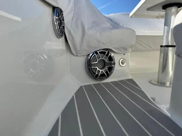 Slide: The Image of 2022 Formula 430 Super Sport Crossover boat interior with speakers and sleek flooring. - 18