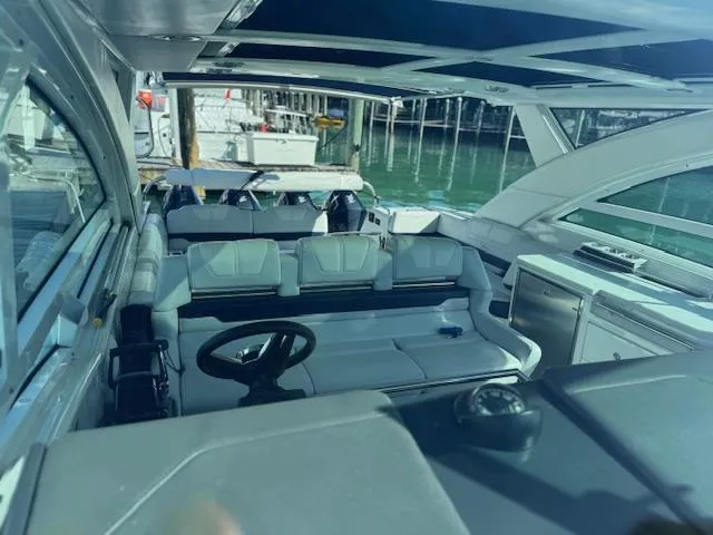 Slide: The Image of 2022 Formula 430 Super Sport Crossover interior with sleek seating and modern design. - 21