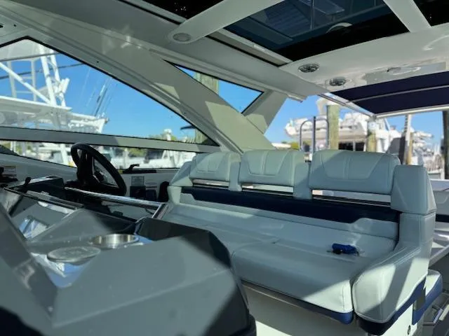 Slide: The Image of 2022 Formula 430 Super Sport Crossover interior with luxurious seating and modern helm. - 22