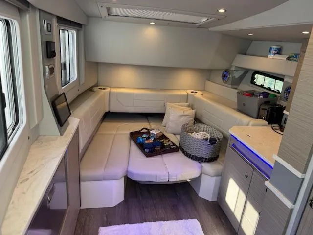 Slide: The Image of Interior of 2022 Formula 430 Super Sport Crossover, featuring luxurious seating and modern amenities. - 33