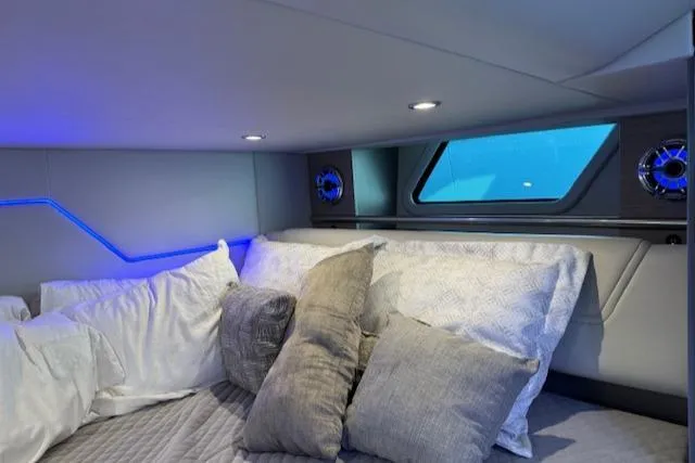 Slide: The Image of Luxurious cabin interior of 2022 Formula 430 Super Sport Crossover with plush bedding. - 34