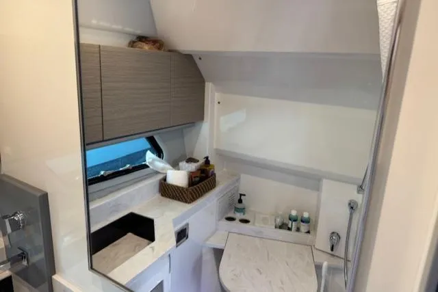 Slide: The Image of Modern bathroom interior in 2022 Formula 430 Super Sport Crossover yacht, featuring sleek design and amenities. - 38