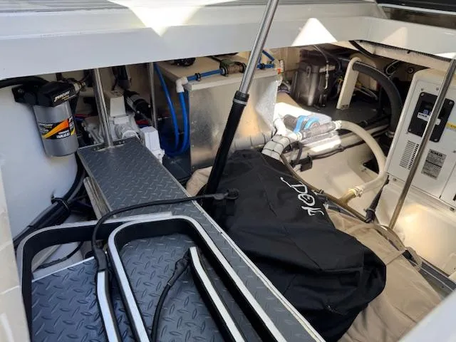Slide: The Image of Engine compartment of 2022 Formula 430 Super Sport Crossover, showcasing mechanical components and storage. - 41