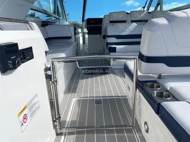 Slide: The Image of 2022 Formula 430 Super Sport Crossover interior with luxurious seating and modern amenities. - 6