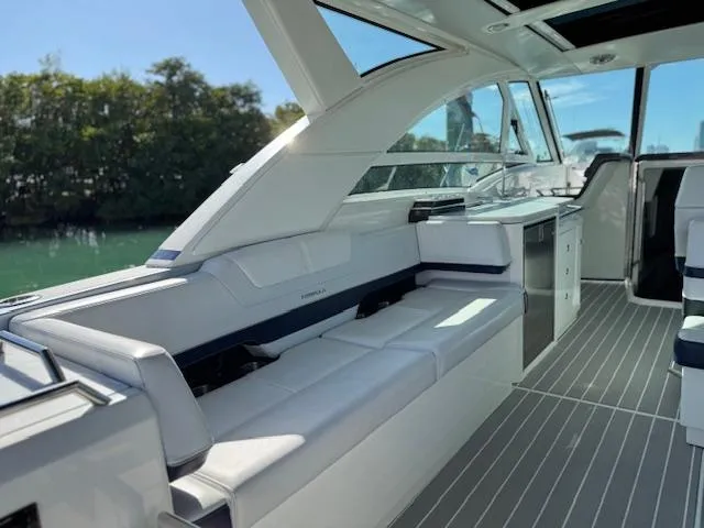 Slide: The Image of 2022 Formula 430 Super Sport Crossover interior with sleek seating and modern design. - 9