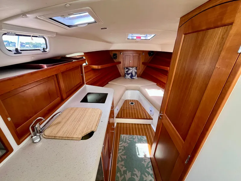 Slide: The Image of Luxurious interior of 2019 MJM 35z boat with wood finish and modern amenities. - 4