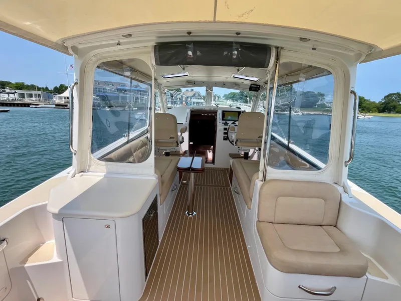 Slide: The Image of Interior view of a 2019 MJM 35z boat with seating and helm. - 10