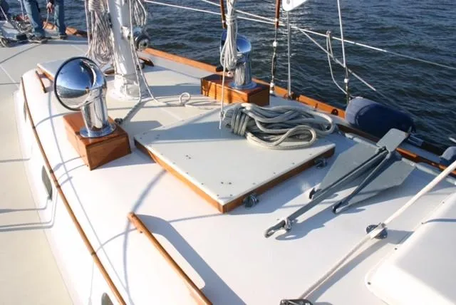 Slide: The Image of Hinckley Bermuda 40 sailboat deck, 1967 model, with ropes and polished fittings. - 10