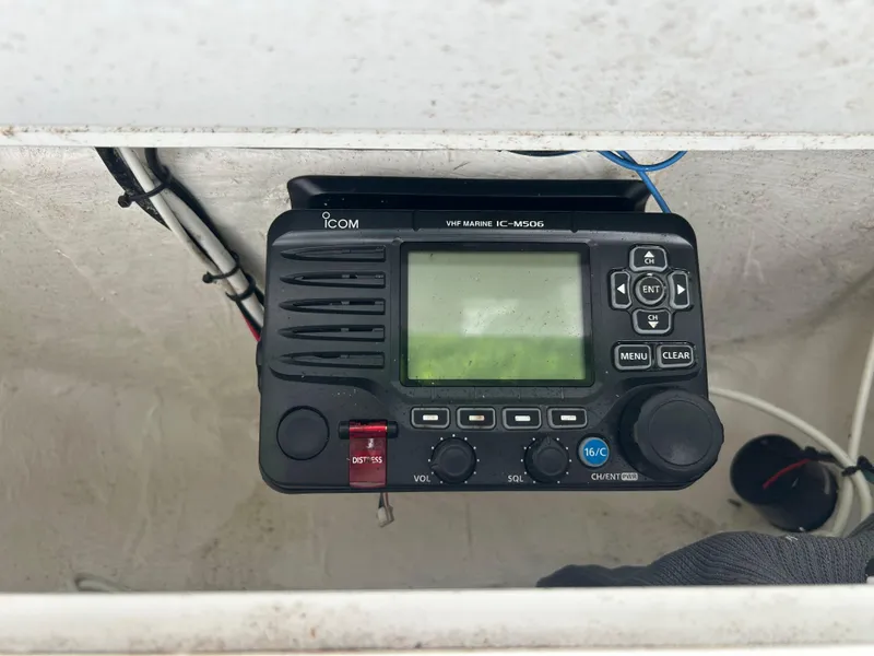 Slide: The Image of VHF marine radio installed on a 2020 Tidewater 272 CC Adventure boat. - 15