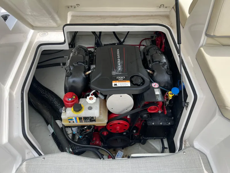 Slide: The Image of Engine compartment of a 2022 Regal Fasdeck boat, featuring a Volvo Penta engine. - 15