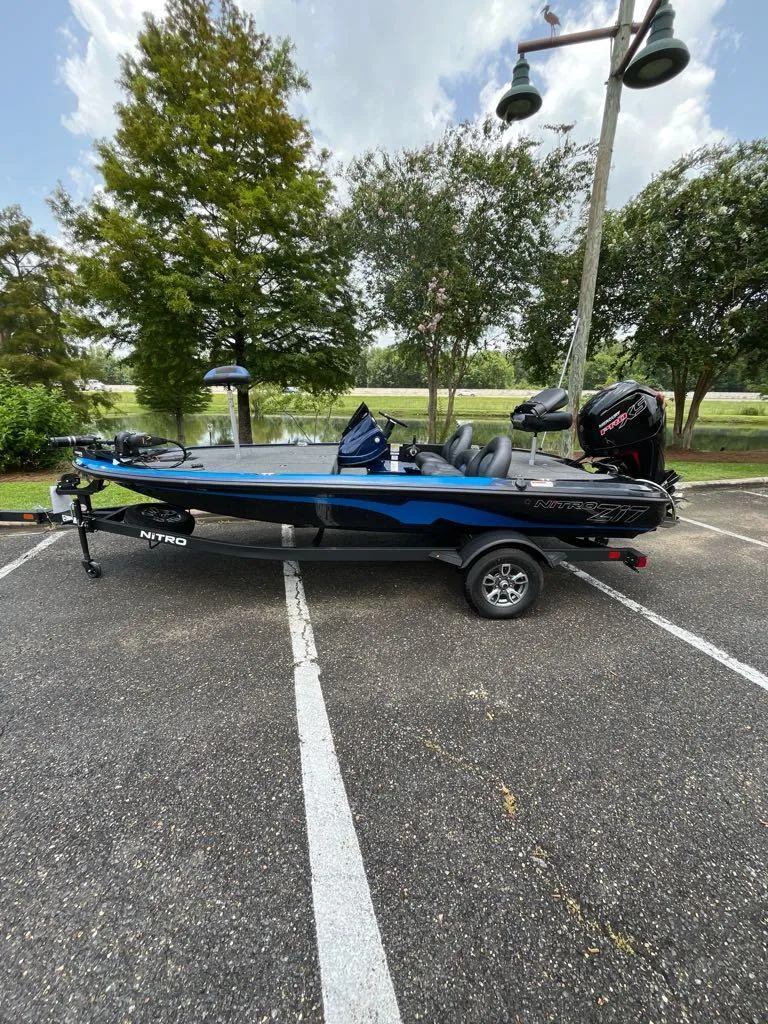 The Image of 2025 Nitro Z17 boat parked outdoors, featuring sleek design and modern equipment. - 0