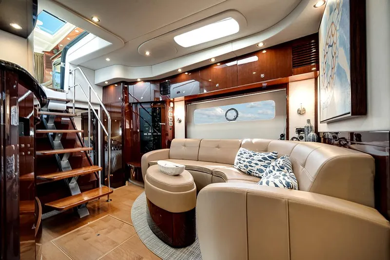 Slide: The Image of Luxurious interior of 2012 Sea Ray 610 Sundancer yacht with elegant seating and modern design. - 26