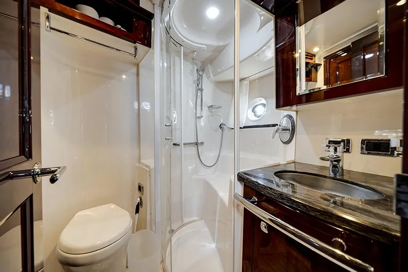 Slide: The Image of Luxurious bathroom in 2012 Sea Ray 610 Sundancer yacht with modern fixtures. - 41