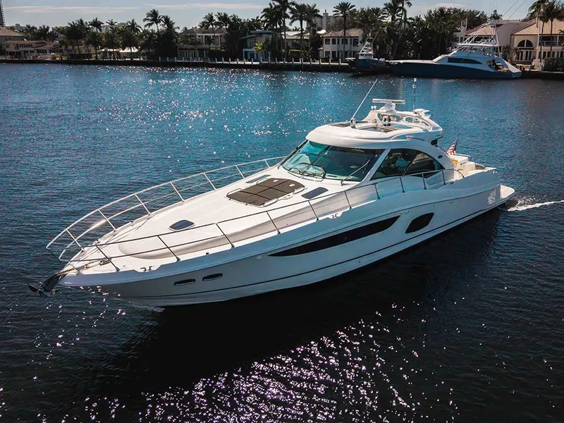 Slide: The Image of Luxurious 2012 Sea Ray 610 Sundancer yacht cruising on a sunny day. - 43