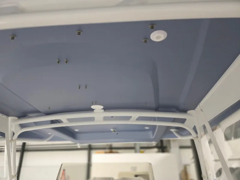 Slide: The Image of 2021 Intrepid 345 Valor boat interior ceiling with mounted fixtures. - 11