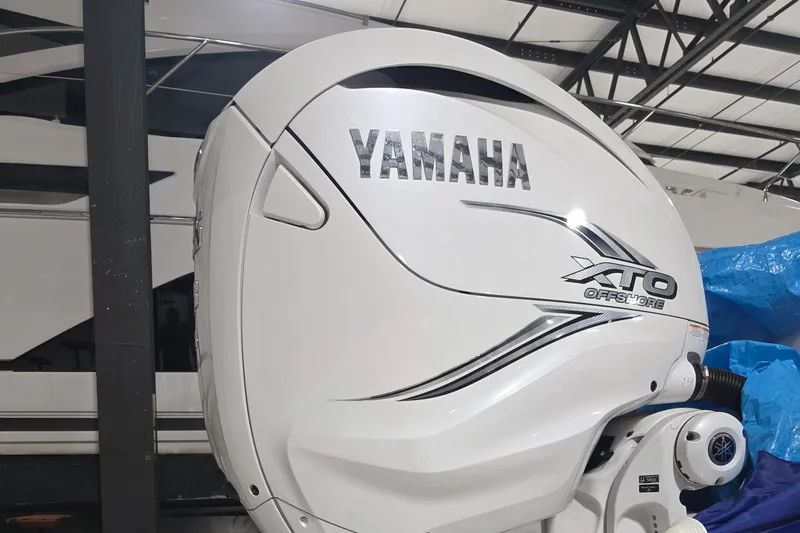 Slide: The Image of Yamaha XTO Offshore engine on 2021 Intrepid 345 Valor boat in a warehouse. - 39