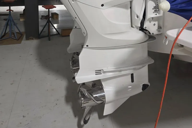 Slide: The Image of 2021 Intrepid 345 Valor boat engine in a workshop setting. - 43