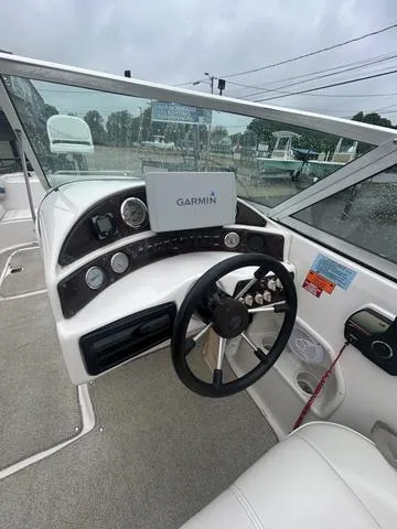 Slide: The Image of 2001 Hurricane 237 Sun Deck boat interior with Garmin navigation system. - 7