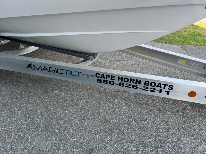 Slide: The Image of Boat trailer with Cape Horn 24XS, 2026 model, and contact information for Cape Horn Boats. - 19