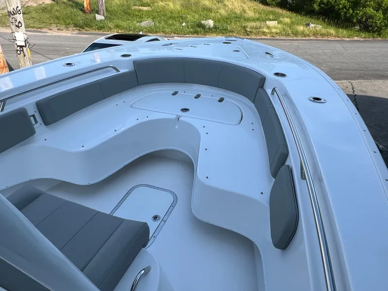 Slide: The Image of 2026 Cape Horn 24XS boat with spacious seating and sleek design. - 5