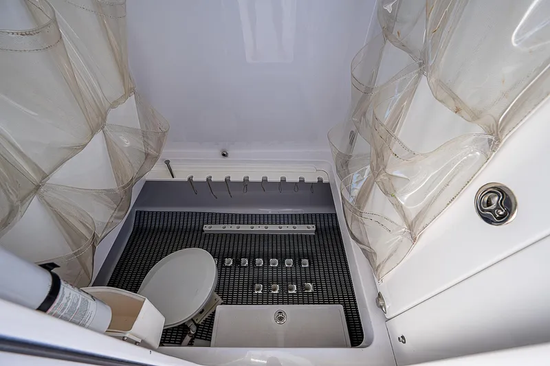 Slide: The Image of 2013 Bahama Quad V10's interior with storage compartments and netting. - 22