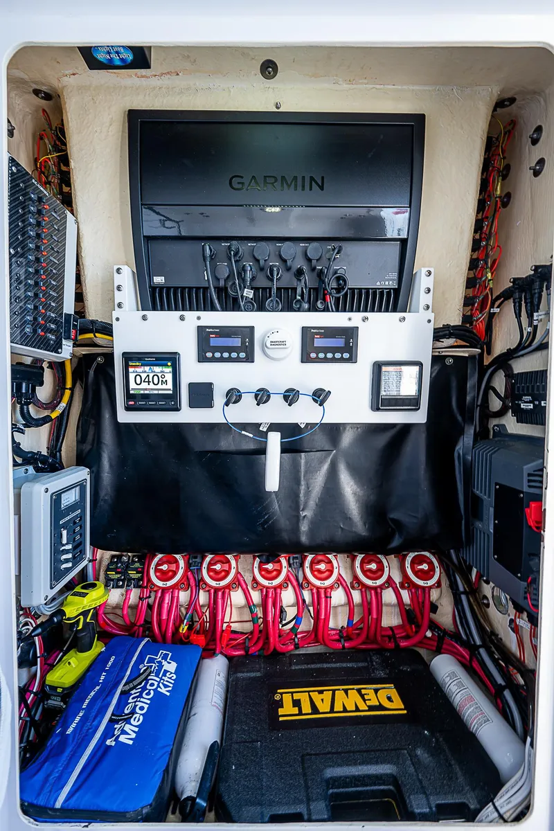 Slide: The Image of Electrical panel of 2013 Bahama Quad V10's boat with Garmin equipment. - 24