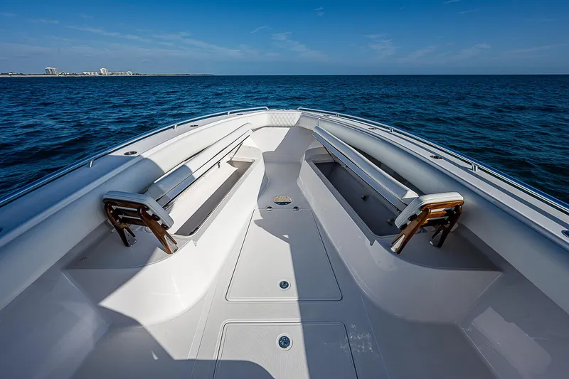 Slide: The Image of 2013 Bahama Quad V10's boat deck with ocean view under clear blue sky. - 26
