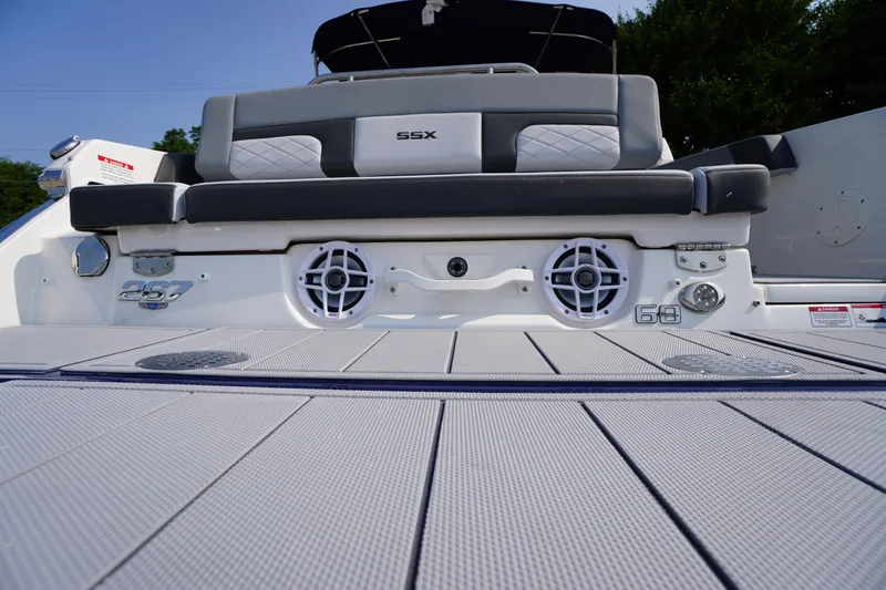 Slide: The Image of 2025 Chaparral 267 SSX boat with spacious rear deck and seating area. - 11