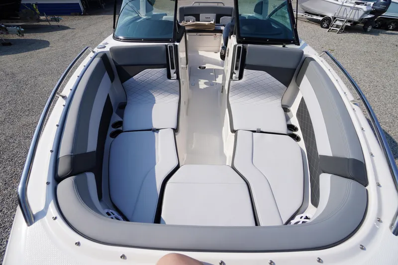 Slide: The Image of 2025 Chaparral 267 SSX boat interior with spacious seating and modern design. - 20