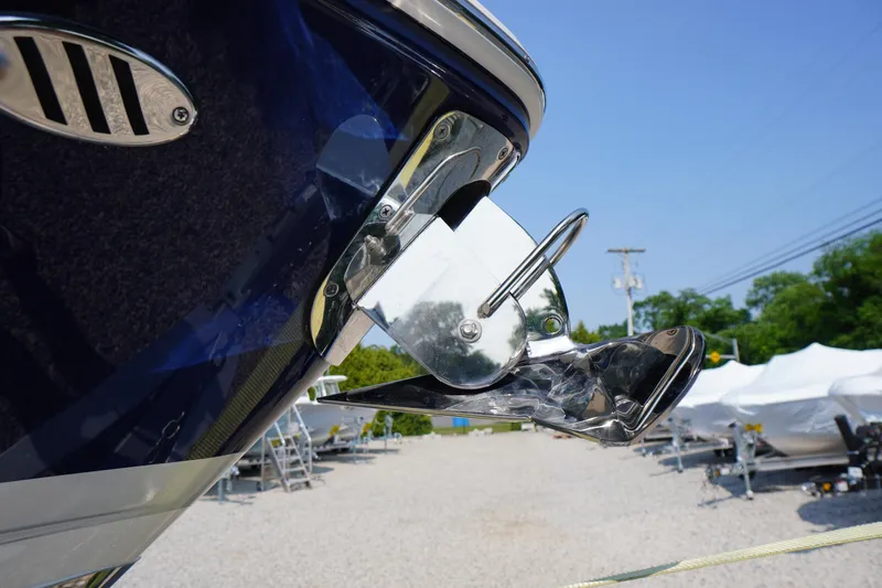 Slide: The Image of 2025 Chaparral 267 SSX boat on trailer, front view, in a sunny outdoor setting. - 5