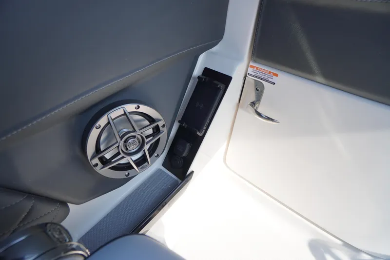 Slide: The Image of 2025 Chaparral 267 SSX boat interior with sink and portable toilet. - 40