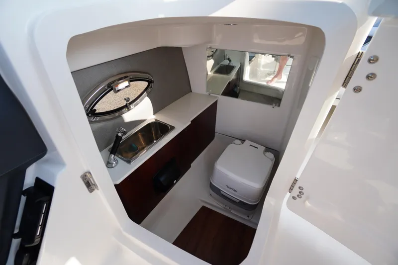 Slide: The Image of Steering wheel cover in 2025 Chaparral 267 SSX boat cockpit, featuring Gussi Italia branding. - 44